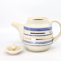Teapot in blue and gold