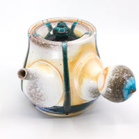 Side-handled teapot, soda fired