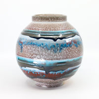 Soda-fired porcelain orb vase