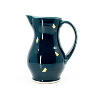 Summer pitcher in peacock and gold