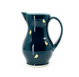 Summer pitcher in peacock and gold