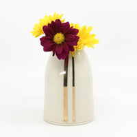 Bud vase in snow white and gold