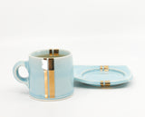 Espresso mug and saucer set in sky