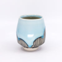Five o'clock cocktail cup in sky