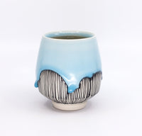 Five o'clock cocktail cup in sky