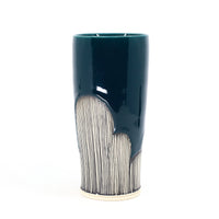 Tumbler in peacock