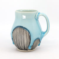 Belly mug in sky