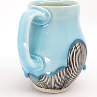 Belly mug in sky