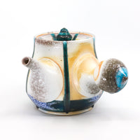 Side-handled teapot, soda fired