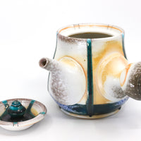 Side-handled teapot, soda fired