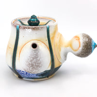 Side-handled teapot, soda fired