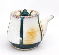 Side-handled teapot, soda fired