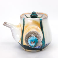 Side-handled teapot, soda fired