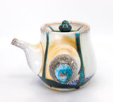 Side-handled teapot, soda fired