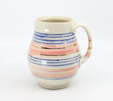 Belly mug in blue, pink and gold