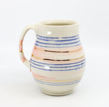 Belly mug in blue, pink and gold